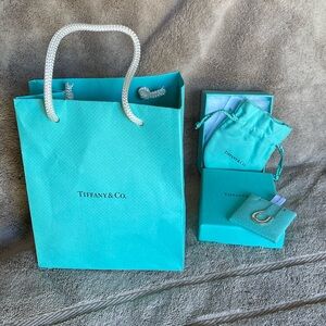 Tiffany & Co Sterling silver horseshoe pendant.  Never been worn.  Brand new!